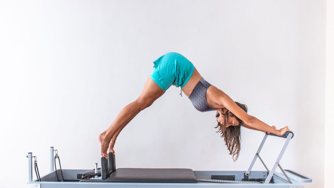 Long stretch: the reformer plank that rebuilds your core